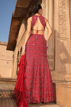 Red attached cancan lehenga with all over chevron embroidery using glass beads, crystals and resham. Paired with a padded blouse with similar work and back cut-out detailing. Comes along with a ruffle dupatta. - Aza Fashions High Neck Lehenga, Chevron Embroidery, Ruffle Dupatta, Cancan Lehenga, Lehenga And Blouse, Lehenga Pattern, Padded Blouse, Embroidered Lehenga, Satin Color