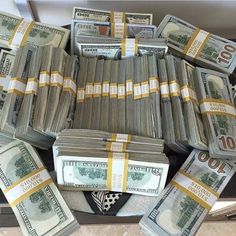 many bundles of money are stacked on top of each other