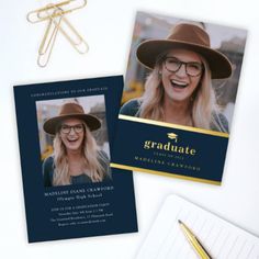 a graduation announcement card with a photo on it next to a pen and paper clip