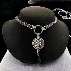 Handmade Celtic Necklace . Double Stainless Steel Cable Link Chain With Silver Plated Celtic Knot Coin & Dangly Black Stone . Double Cable Chain Is 16.5 Inch Long . ( If You Need A Different Size Lmk ) Chains Are Stainless Steel Material ( Nickel Free , Allergy Free , Hypoallergenic , No Itching , Do Not Change Color ) Celtic Knot Charm Is Silver Plated . Tags : Boho / Bohemian / Bohochic / Goth / #Gothic / Celt / #Celtic / #Fairy / #Irish / St Patrick's Day / Ireland / Nordic / Viking / Trisque Gothic Stainless Steel Silver Chain Jewelry, Adjustable Gothic Stainless Steel Necklace, Black Stainless Steel Choker, Black Stainless Steel Dangle Jewelry, Celtic Heart Knot, Celtic Fairy, Medieval Fair, Celtic Necklace, Casual Necklaces