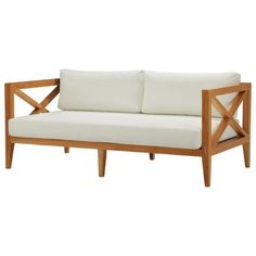 a wooden couch with white pillows on it's back and arm rests against a white background