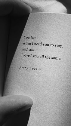 a hand holding an open book with a poem on it's cover that reads, you left when i need you to stay and still i loved you all the same