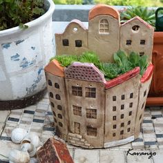 a potted planter that has some plants in it