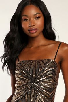 Lulus Exclusive! When you arrive in the Lulus Lost In Your Eyes Gold Sequin Bodycon Mini Dress, everyone won't be able to take their eyes off of you! Sparkling gold sequin-adorned mesh, atop a black liner, shapes this sexy mini that has a straight neckline (with hidden no-slip strips) and adjustable spaghetti straps. A fitted, darted bodice sweeps down a figure-flaunting silhouette that ends at a mini hem. Hidden back zipper/clasp. Fit: This garment fits true to size. Length: Mid-thigh. Size sma Gold Sleeveless Sequin Fabric For Party Season, Gold Sequin Fabric For Party Season, Glamorous Gold Sequin Fabric For Prom Season, Gold Sequin Fabric For Party And Prom Season, Gold Sequin Fabric For Prom Season, Gold Sequin Dress For Homecoming And Prom Season, Gold Sequin Dress With Contrast For Party Season, Gold Embellished Sequin Dress For Date Night, Gold Sequin Dress For Prom Night Out