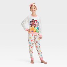 Elevate your child's wardrobe with this Disney Princess 2-Piece Pajama Set and Headband in white. This pack includes a headband, a polyester long-sleeve sleep shirt with a Disney princess print designed in a crew neckline, and a pajama pant with allover Disney-themed prints—for a fan-favorite look. Tailored in a regular fit, this pajama set is great for casual evenings or just lounging at home. All Disney Princesses, Cozy Pajamas, Princess Girl, Casual Evening, White Headband, Pajama Pant, Sleep Shirt, Kids Outfits Girls, Disney Girls