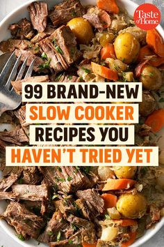 a white bowl filled with meat and vegetables on top of a gray table next to a fork