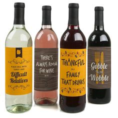 three bottles of wine with labels on them