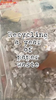 a plastic container filled with paper waste and the words recycling a year of paper waste