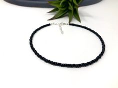 "Handmade item Made to Order * Materials * ----------------- Size 6 black glass seed beads (approx. 4mm in size) * Dimensions * -------------------- Total Length: choose the length you want. There will be an additional 1\" extender chain for all lengths 10\" and below and a 2\" extender chain for all lengths 10.5\" and longer. * Details * ------------- Order the size you need for a bracelet, anklet or choker necklace. Each item is crafted with size 6/0 black glass seed beads. It closes with a lo Black Anklets With Round Beads For Gift, Adjustable Black Anklet With Tiny Beads, Turquoise Bead Jewelry, Choker Necklace Black, Seed Bead Choker, Black Choker Necklace, Bead Choker, Seed Bead Bracelet, Black Seed