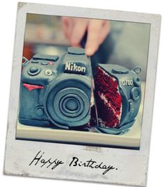 a couple of cakes that are on top of a table with the words happy birthday written in front of them