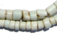 two white beads on a white background