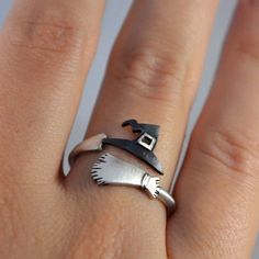 This Halloween Ghost Witch Broom Finger Rings is the unique piece that makes your look perfect. A great gift for you and your loved one.💝 🔰QUALITIES: Material ⮞ 925 Sterling Silver , Packaging ⮞ All items are nicely packaged in decent velvet jewellery boxes, ready to gift someone.🎁 Made with great care and value. 🔰HOW TO ORDER: ⮞ Fill in the Details about your order in personlization box (i.e: Three letter initial), If needed. ⮞ You can contact us before or even after the order. 🔰POLICIES: ⮞ All items are custom made to order. ⮞ Our turn around time is about 6 - 10 business days. This can change during peak seasons. ⮞ We use USPS for Delivery in America. ⮞ If you can't find the information you need or need some advice for your design? Feel free to contact us. We are fast to reply 😊 Witch Rings, Halloween Ring, Ghost Witch, Witch Broom, Cuff Rings, Halloween Jewelry, Holiday Jewelry, Rings Cool, Creative Jewelry