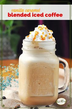 an iced coffee drink with whipped cream and sprinkles