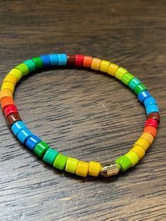 This fun, colorful bracelet is 7 inches on super strong stretch cord.  The beads have a cool metal feel to them that is very pleasing to wear.  Have fun and add some color to your accessories!  Thanks for stopping by and we hope you find something you love in our shop! Be beautiful! Colorful Bead Bracelets, Star Wars Jewelry, Colorful Bracelet, Friendship Bracelets With Beads, Rainbow Bracelet, Freshwater Pearl Bracelet, Colorful Jewelry, Glass Beaded Bracelets, Seed Bead Bracelets