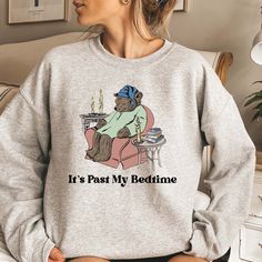 It's Past My Bedtime Sweatshirt, Funny Crewneck, Funny Meme Sweater, Sleepy Bear Sweatshirt, Trendy Y2k Shirt HOW TO ORDER 1. Check our photos for color and sizing options.  2. Choose your quantity. 3. Select your size and color from the drop-down menus. 4. Click "ADD TO CART" to add the shirt to your virtual cart.  5. Click "PROCEED TO CHECKOUT" to purchase your shirt.  6. Your shirt is now off to production! We will process your order and your shirt will be ready to ship in 1-3 days! PRODUCTIO Cozy Crew Neck T-shirt With Letter Print, Cozy Fit Graphic Print Crew Neck Top, Cozy Fit Crew Neck Leisure Top, Leisure Cozy Fit Crew Neck Tops, Cozy Fit Crew Neck Top For Leisure, Comfortable Graphic Print Sweatshirt For Leisure, Relaxed Fit Sweatshirt With Funny Print For Loungewear, Cozy Long Sleeve T-shirt With Graphic Print, Bear Meme