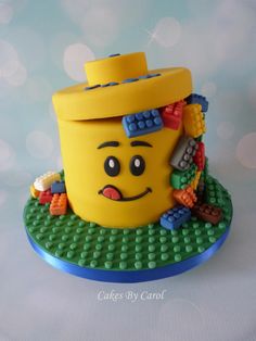 a yellow lego hat sitting on top of a table