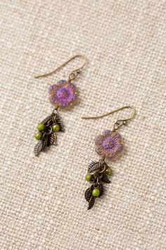 The Czech Glass Collection offers a varied selection of handcrafted earrings, including this cluster design featuring a Czech Glass flower and antique brass leaves for a casual look. Antique Brass (Lead & Nickel Free) Czech Glass 2" with antique brass ear wires We hand select our natural materials, thus there may be slight variations in color and/or size that will not detract from the overall aesthetic. Our unique handcrafted designer jewelry for women is made in America, each design created ind Floyd Va, Czech Glass Jewelry, Flower And Leaves, Cluster Design, Beading Inspiration, Handmade Clay Jewelry, Diy Jewelry Inspiration, Flower Leaves, Small Boho