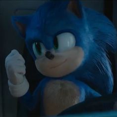 sonic the hedgehog is waving at someone