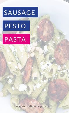 pasta with pesto and pine nuts in a white bowl