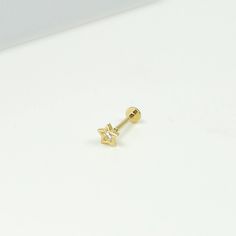 14K Solid Gold Tiny Star with CZ Internally Threaded Labret Stud Earring, Piercing Earring, Lobe Tragus Cartilage Helix Piercing, Tragus Stud Earring, Conch Stud, Flat Back Earring, Piercing Earring, Minimalist Earring, Simple Stud, Geometric Earring, Dainty Earring * Gold Kt: 14K solid gold * Available Gold Color: Yellow Gold * Star : 4mm * Bar Post Thickness : 1mm (18Gauge) * Bar Post length : 6mm * Bar Post length : 8mm * Flat Back Size : 3 mm * Every order comes with a gift box **This listin Tiny Gold Star Cartilage Earrings, Gold Piercings With Star Charm As Gift, Celestial Star-shaped Piercings For Gifts, Celestial Star Piercings Gift, Celestial Star-shaped Piercings As Gift, Gold Star Cartilage Earrings For Pierced Ears, Gold Star Shaped Pierced Cartilage Earrings, Gold Star Cartilage Earrings, Cartilage Helix Piercing