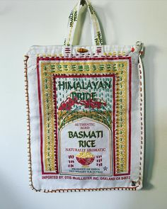 a bag hanging on the wall with an advertisement for himalavam pure rice