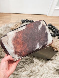 Wipeable canvas material Lined on the inside with zipper closure 6.5” x 9” •Bags are FINAL SALE• Western Luggage Sets, Western Makeup, Cowhide Makeup Bag, Western Clutch Purse, Western Purses And Handbags Fabric, Cowhide Clutch, Purse Jewelry, Makeup Bags, Winter Sale