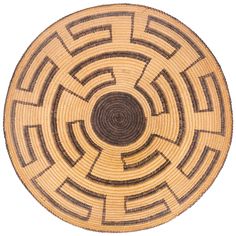 a brown and black circular basket on a white background