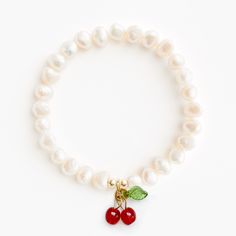 Add a little sweetness to your stack! 6-7mm freshwater pearls with 14k gold filled end beads (4mm) and an acrylic & glass cherry charm Please note that our bracelets are not intended to be worn by children 5 and under. To preserve the color and quality of the charm, we recommend avoiding moisture as much as possible. Cherry Ring, Cherry Charm, Women Bride, Grandma Birthday, Mon Cheri, Mom And Grandma, Cherry On Top, Letter Charms, Gold Letters