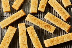 several pieces of bread sitting on top of a grill