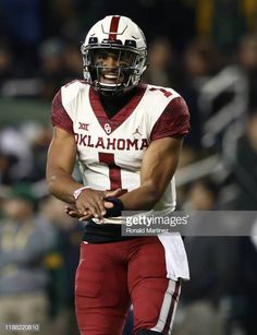 a football player with his mouth open during a game