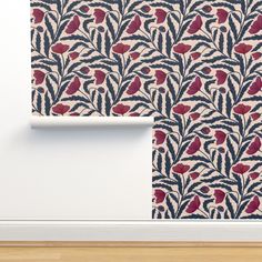 an image of wall paper with flowers and leaves on it in the corner of a room