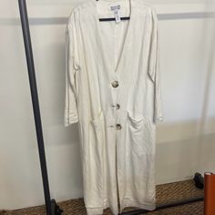 Beautiful Long White Dress Coat/Duster Size L From Brand Ajaie Alaie. Gorgeous Piece, Perfect Like-New Condition. Worn Once By Seller Before Me, Never Worn By Me. Long Unlined Spring Dress, Spring Midi Dress With Button Closure, Spring Long Midi Dress With Button Closure, Unlined Long Dresses For Spring, Casual Long Unlined Dresses, White Long Dress For Work, Long White Dress For Work, Linen Long Sleeve Midi Dress For Brunch, Classic Long Sleeve Linen Dress