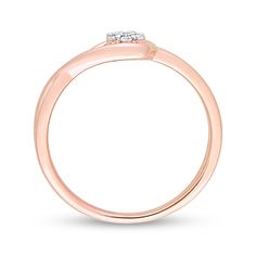 a rose gold ring with two diamonds on top