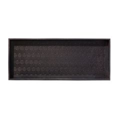 a rectangular tray with an intricate design on the front and sides, in dark brown