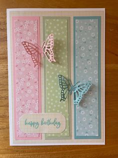 a card with butterflies on it and the words happy birthday written in blue, green, pink