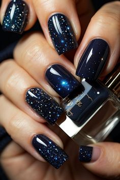 Create a starry night look on your nails with these 10 stunning nail designsFrom galaxy-inspired designs to sparkling star accentsthese nail art ideas will make your nails look out of this worldGet inspired and find the perfect starry night nail design for your next manicure. Night Nail Designs, Night Nail Art, Nails Inspiration Glitter, Galaxy Nail Art, Manikur Kuku, Galaxy Nails, A Starry Night, Sparkle Nails