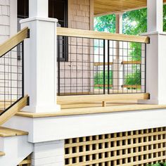 a porch with railings and wooden steps