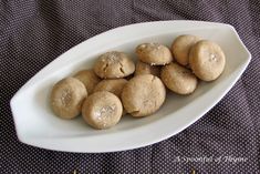 a white plate filled with cookies on top of a table