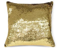 a gold sequin pillow on a white background