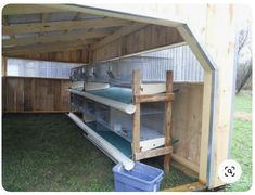 the inside of a small chicken coop