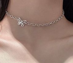 High Quality Butterfly Necklace | Butterfly Choker Necklace | Trendy Necklace | Fancy Vintage Jewelry | Dainty Necklace | Gift Ideas * Material: 925 Sterling Silver * Finish: 925 Sterling Silver * Dimensions: Length 12.5in - 17in, Pendant .75in x .5in Butterfly necklace Size: 12.5in long without extension, 17in long with extension  🌎Production Time & Shipping🌎 * Because our products are custom made, please allow 2-3 business days for production. This can change during peak seasons. Expedite shipping does not change our production time. * Shipping USPS First Class (U.S.) 1-3 business days * Shipping USPS International: 1-2 Weeks JEWELRY CARE Keeping your jewelry as dry as possible will help prolong the nature of its color and shine. Apply lotions, sprays, and perfumes before putting on je Butterfly Choker Necklace, Necklace Gift Ideas, Necklace Fancy, Butterfly Choker, Necklace Butterfly, Key Pendant Necklace, Trendy Necklace, Jewelry Dainty, Party Earrings