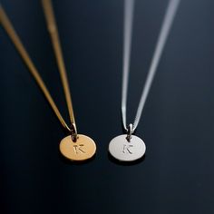 An elegant and minimal necklace features a hand-stamped disc, personalised with a letter of your choice. Great for layering and everyday wear.  d e t a i l s  - hand-stamped in our studio in Norwich, UK - made entirely from 925 sterling silver, 24k gold plated - nickel free - curb chain, spring ring closure  - comes in a beautiful eco-friendly gift box with the Lunity logo  s i z e  - necklace length: 18 inches - 45 cm  (if you need a shorter length (16in) please let us know) - round disc pendan Minimalist Round Disc Charm Necklace For Personalized Gift, Minimalist Round Hand Stamped Charm Necklaces, Minimalist Initial Round Disc Necklace For Personalized Gift, Minimalist Round Disc Initial Necklace For Gift, Minimalist Round Disc Initial Necklace As Personalized Gift, Minimalist Round Disc Initial Necklace As Gift, Minimalist Hand Stamped Initial Necklace, Minimalist Round Name Charm Necklaces, Minimalist Round Charm Necklace With Name