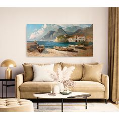 a living room filled with furniture and a painting on the wall above it's couch