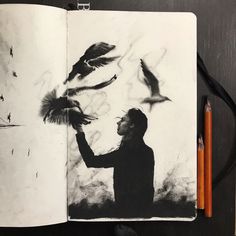 a drawing of a man holding birds in his hand