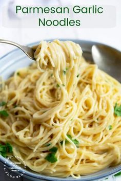 a spoon full of pasta with parmesan garlic noodles in it and the title overlay reads, parmesan garlic noodles