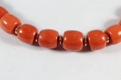 -Vintage 14k Gold Natural Orange Coral Beaded Necklace -Total length: 25 in -Biggest bead size:about 10 mm x 10 mm -Smallest bead size:about 7 mm x 6 mm -Total weight: 65 g -14k gold bead size: 2 mm x 4 mm -Clasp size: 16 mm x 10 mm -Marked 585 Elegant Rondelle Beads For Formal Occasion, Formal Round Beaded Necklace With Spacer Beads, Formal Gemstone Beaded Necklaces, Elegant Formal Hand-strung Beads, Elegant Large Rondelle Beads, Formal Necklace With Large Round Beads, Formal Beaded Necklace With Large Round Beads, Classic Round Beads For Formal Occasions, Formal Single Strand Beaded Necklace With Round Beads