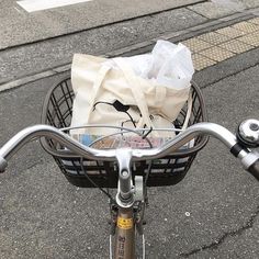 a bicycle with a basket full of items