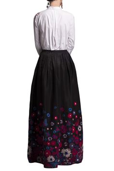 Black maxi skirt with floral embroidered detail paired with top. 
Components: 2
Neckline: High
Sleeve Length: Full
Fabric: Tafetta, Cotton
Color: Black
Closure: Button front
 - Aza Fashions Black Maxi Skirt, Women Skirt, Embroidered Skirt, Skirt Sets, Black Maxi, Set For Women, Aza Fashion, Floral Skirt, Skirt Set