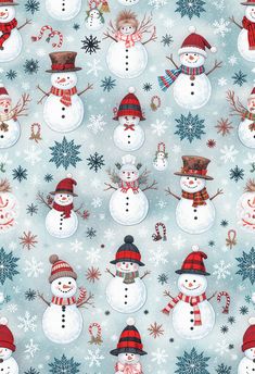 snowmen with hats, scarfs and scarves are depicted in this christmas fabric