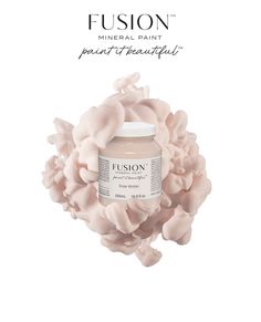 a pink flower with the words fuson mineral paint in front of it and an image of